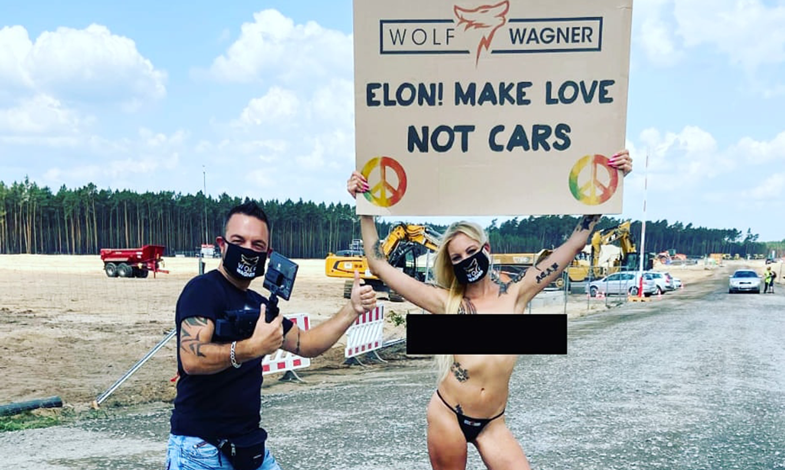 Producer Wolf Wagner Stages Nude Protest Against Tesla in Berlin