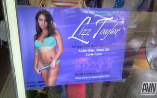 Lizz Tayler signs for fans