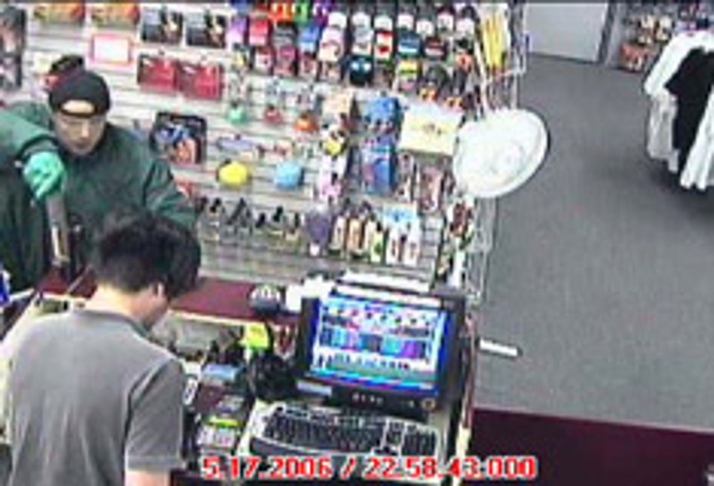 Adult Store Robber Caught on Video