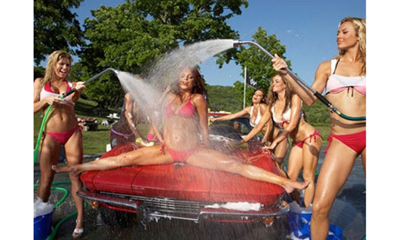 Naked bikini car wash